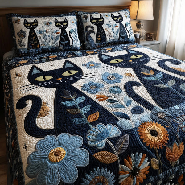 Cat quilted 3-piece bedding set on a made bed with two matching pillow shams