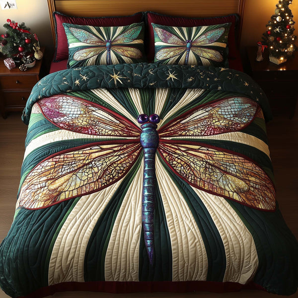 Dragonfly quilted 3-piece bedding set on a made bed with two matching pillow shams