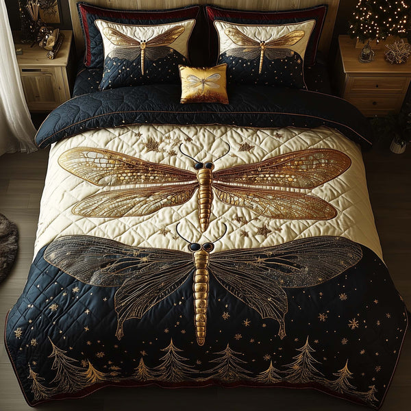 Dragonfly quilted 3-piece bedding set on a made bed with two matching pillow shams