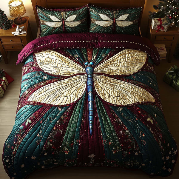 Dragonfly quilted 3-piece bedding set on a made bed with two matching pillow shams