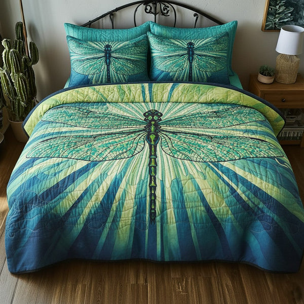 Dragonfly quilted 3-piece bedding set on a made bed with two matching pillow shams