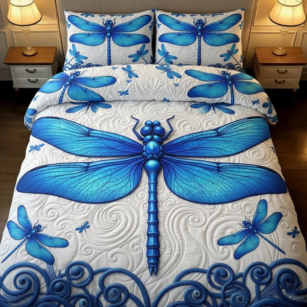 Dragonfly quilted 3-piece bedding set on a made bed with two matching pillow shams