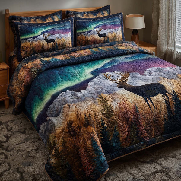 Aurora Dream quilted 3-piece bedding set on a made bed with two matching pillow shams