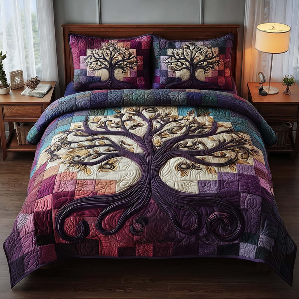 Celestial Tree quilted 3-piece bedding set on a made bed with two matching pillow shams