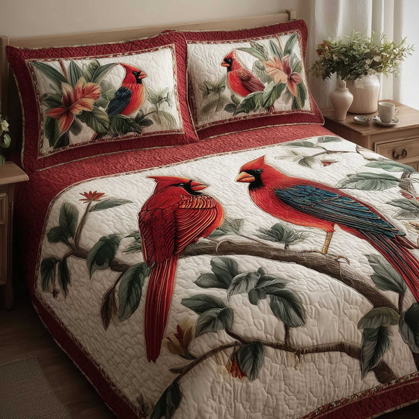 Cardinal Love quilted 3-piece bedding set on a made bed with two matching pillow shams