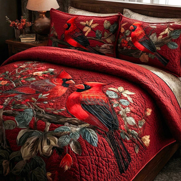 Cardinal Love quilted 3-piece bedding set on a made bed with two matching pillow shams
