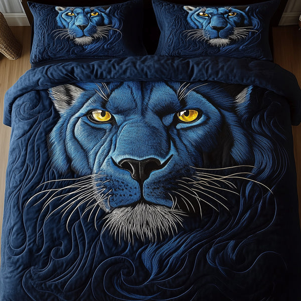 Blue Panther quilted 3-piece bedding set on a made bed with two matching pillow shams