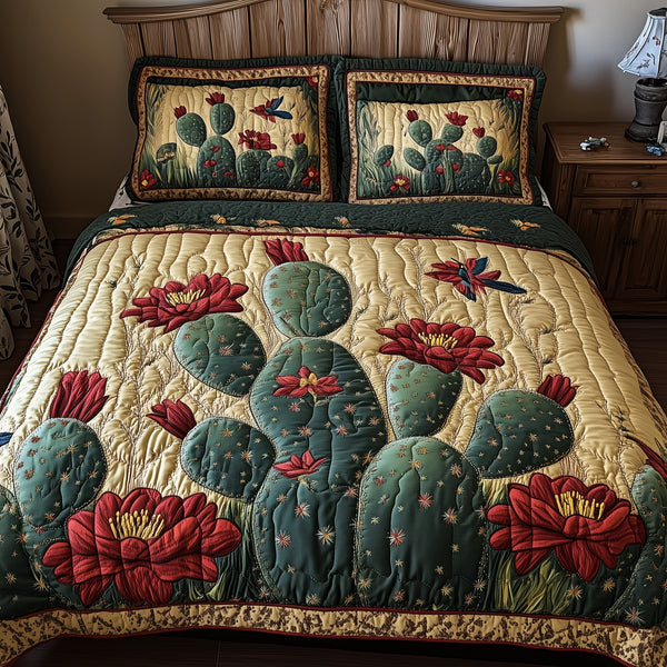 Cactus Dreamer quilted 3-piece bedding set on a made bed with two matching pillow shams