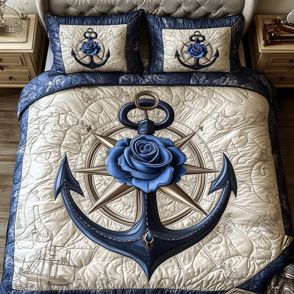 Blue Anchor quilted 3-piece bedding set on a made bed in a light coastal bedroom