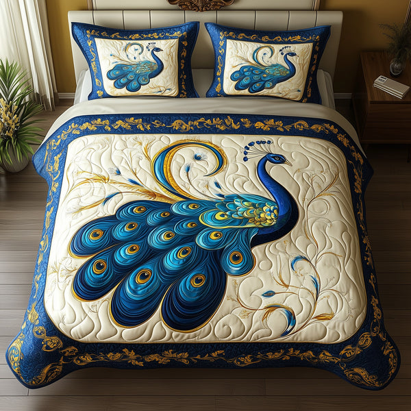 Blue Peacock quilted 3-piece bedding set on a made bed with two matching pillow shams
