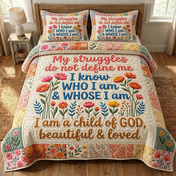 Floral Bible quilted 3-piece bedding set on a made bed in a softly lit bedroom