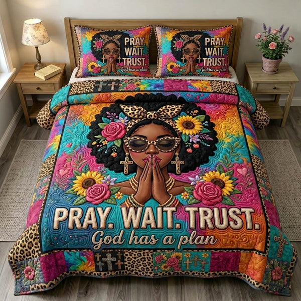 Christian Faith quilted 3-piece bedding set on a made bed in a softly lit bedroom