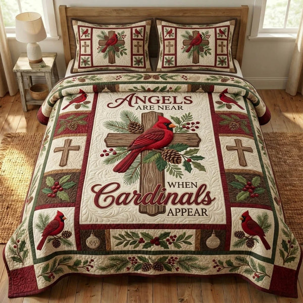 Cardinal Christian quilted 3-piece bedding set on a made bed in a softly lit bedroom