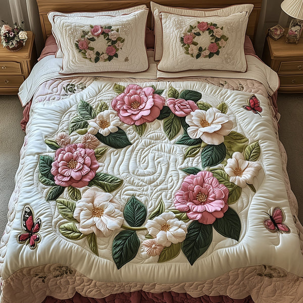 Camellia quilted 3-piece bedding set on a made bed with two matching pillow shams