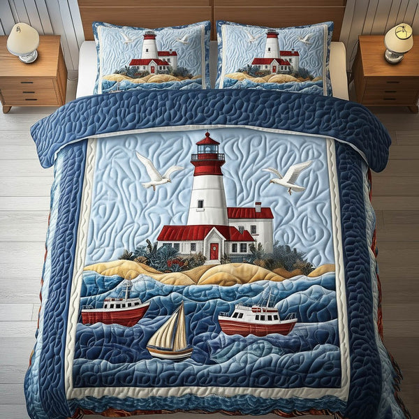 Coastal Lighthouse quilted 3-piece bedding set on a made bed in a light coastal bedroom