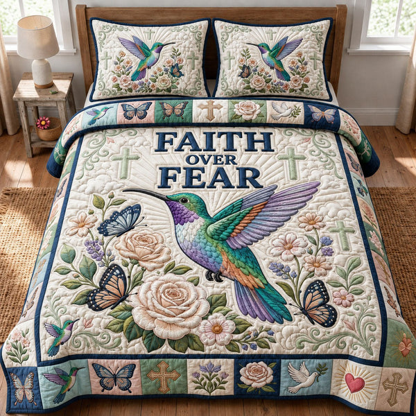 Faith Over Fear quilted 3-piece bedding set on a made bed in a softly lit bedroom