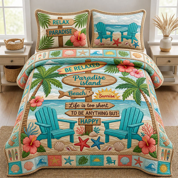 Beach Vacation quilted 3-piece bedding set on a made bed in a light coastal bedroom