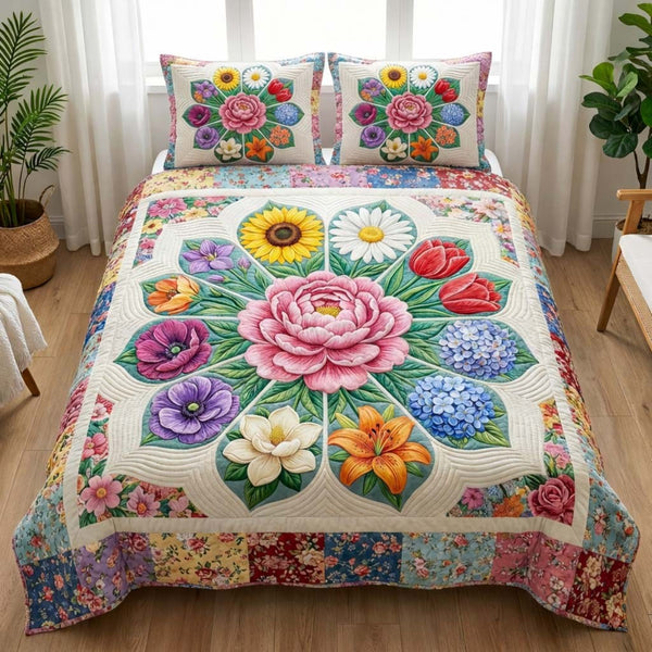 Bloom Rosette quilted 3-piece bedding set on a made bed with two matching pillow shams