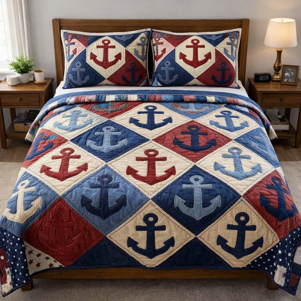Coastal Anchor quilted 3-piece bedding set on a made bed in a light coastal bedroom
