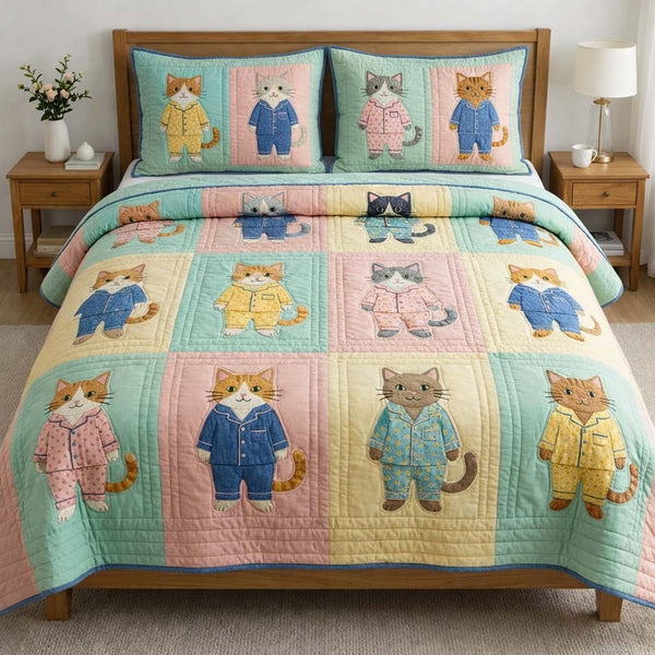 Cat Serenity quilted 3-piece bedding set on a made bed with two matching pillow shams