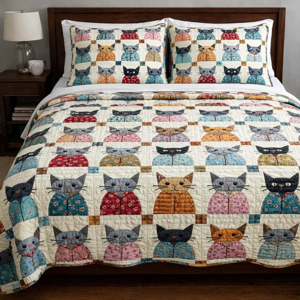 Cat Serenity quilted 3-piece bedding set on a made bed with two matching pillow shams