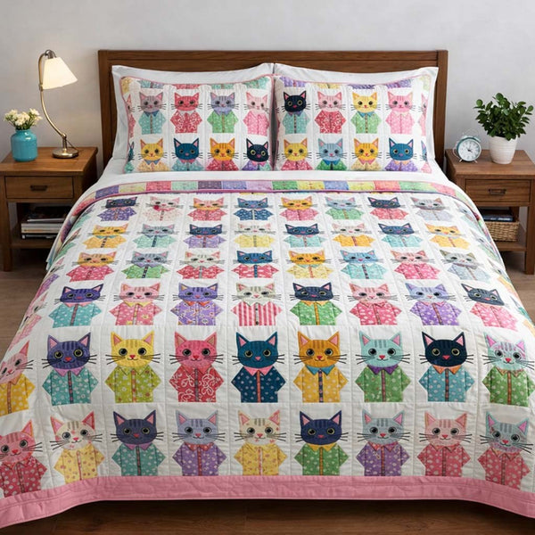 Cat Serenity quilted 3-piece bedding set on a made bed with two matching pillow shams