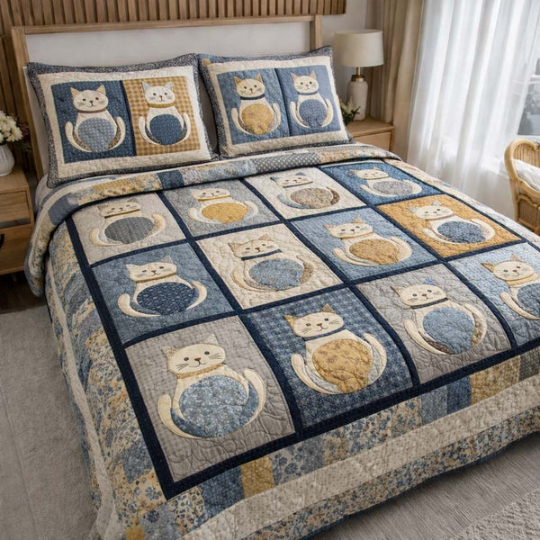 Cat Serenity quilted 3-piece bedding set on a made bed with two matching pillow shams
