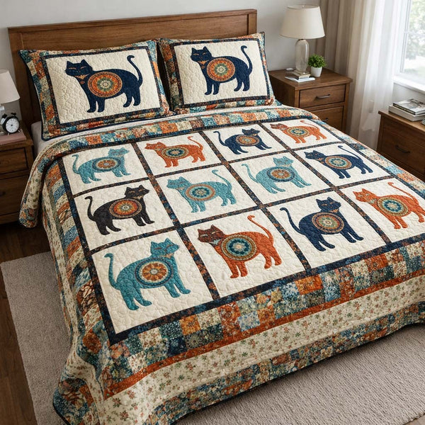 Cat Serenity quilted 3-piece bedding set on a made bed with two matching pillow shams