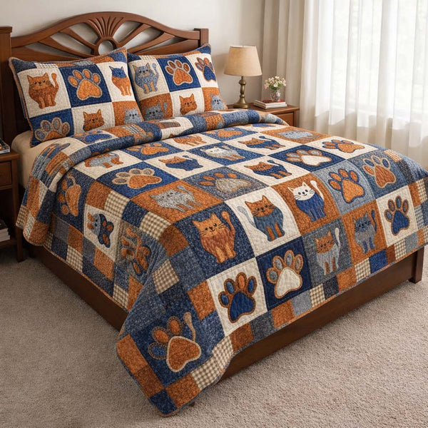 Cat Serenity quilted 3-piece bedding set on a made bed with two matching pillow shams