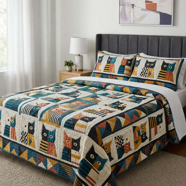 Cat Serenity quilted 3-piece bedding set on a made bed with two matching pillow shams
