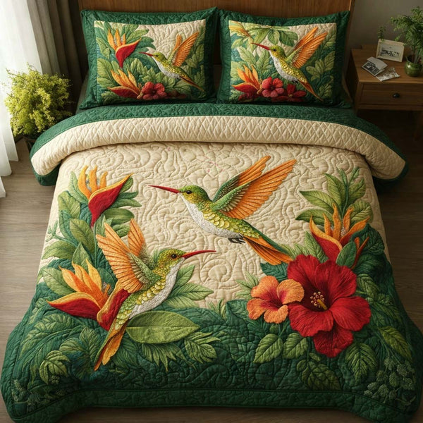 Emerald Hibiscus quilted 3-piece bedding set on a made bed with two matching pillow shams