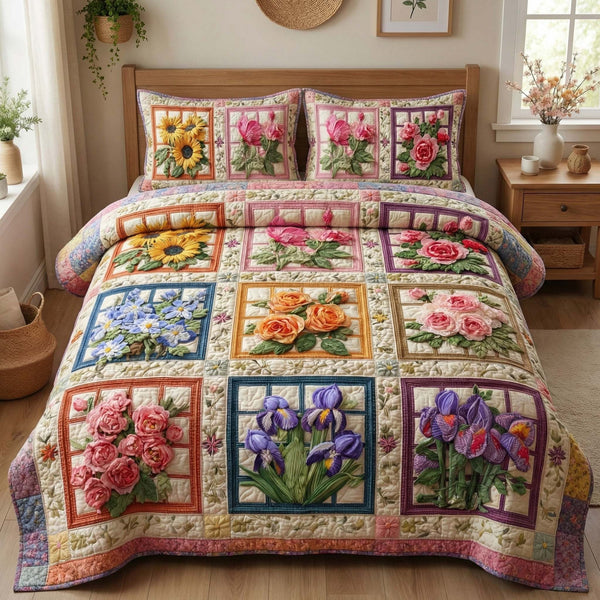 Blossom Grace quilted 3-piece bedding set on a made bed with two matching pillow shams