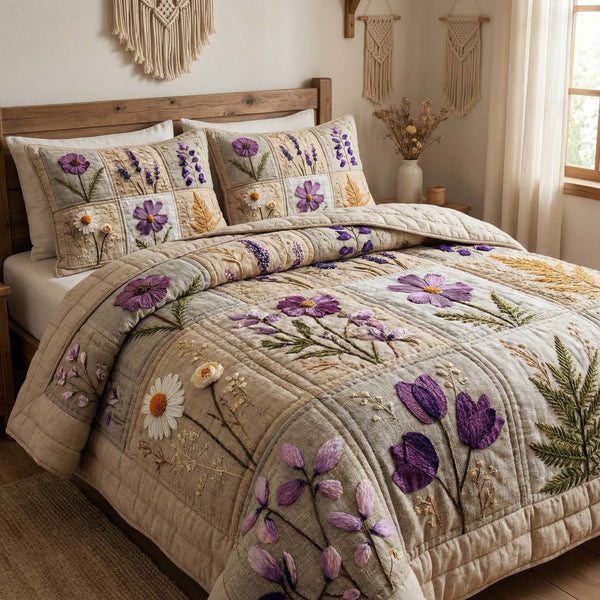 Blossom Grace quilted 3-piece bedding set on a made bed with two matching pillow shams