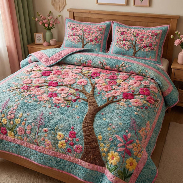 Blossom Life quilted 3-piece bedding set on a made bed with two matching pillow shams