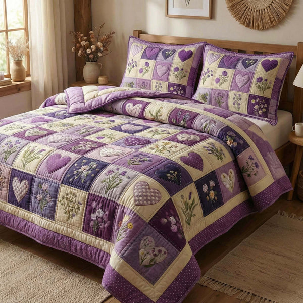 Blossom Grace quilted 3-piece bedding set on a made bed with two matching pillow shams