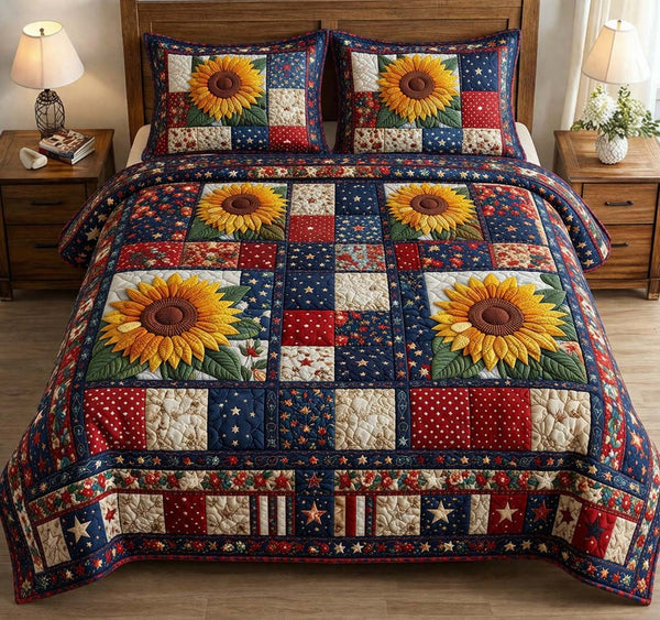 Amber Bloom quilted 3-piece bedding set on a made bed with two matching pillow shams