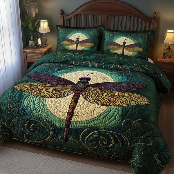 Dragonfly Mandala quilted 3-piece bedding set on a made bed with two matching pillow shams