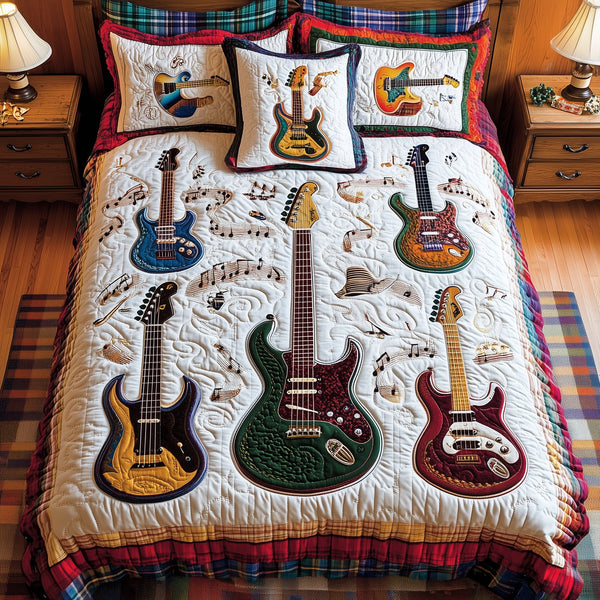 Electric Guitar Collection quilted 3-piece bedding set on a made bed with two matching pillow shams