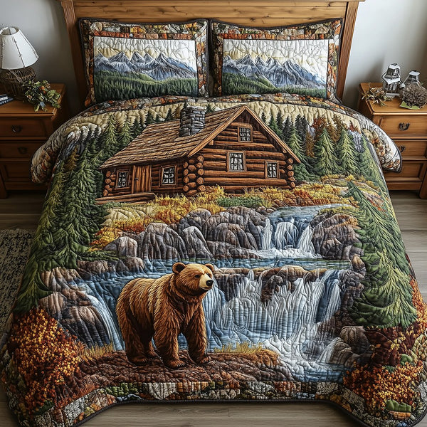 Bear and Cabin quilted 3-piece bedding set on a made bed with two matching pillow shams