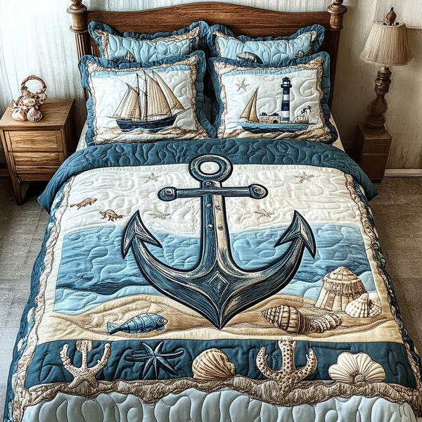 Anchor to the Soul quilted 3-piece bedding set on a made bed in a light coastal bedroom