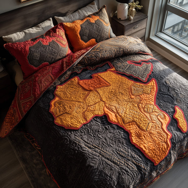 African Roots quilted 3-piece bedding set on a made bed with two matching pillow shams