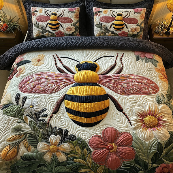 Bee quilted 3-piece bedding set on a made bed with two matching pillow shams
