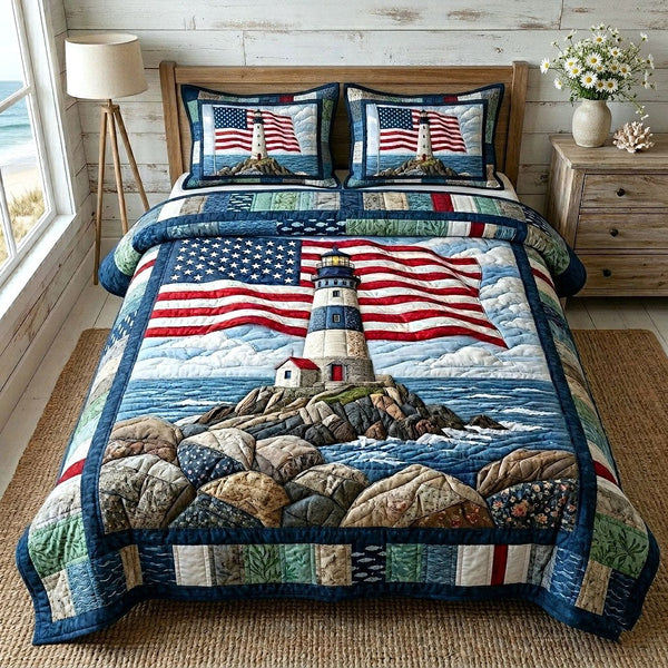 Coastal Glow quilted 3-piece bedding set on a made bed in a light coastal bedroom