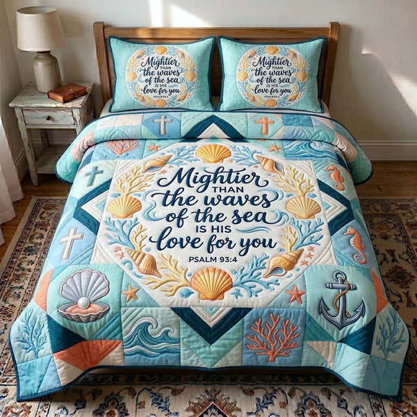 Coastal Blessings quilted 3-piece bedding set on a made bed in a light coastal bedroom