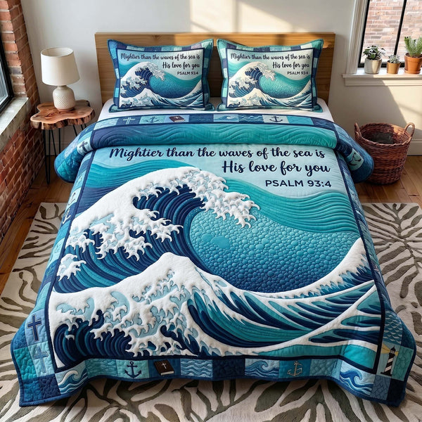 Coastal Blessings quilted 3-piece bedding set on a made bed in a light coastal bedroom