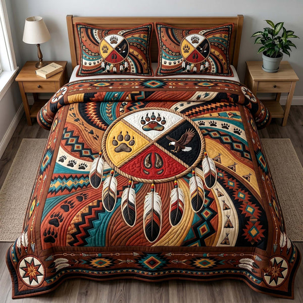 Ancestral Roots quilted 3-piece bedding set on a made bed with two matching pillow shams