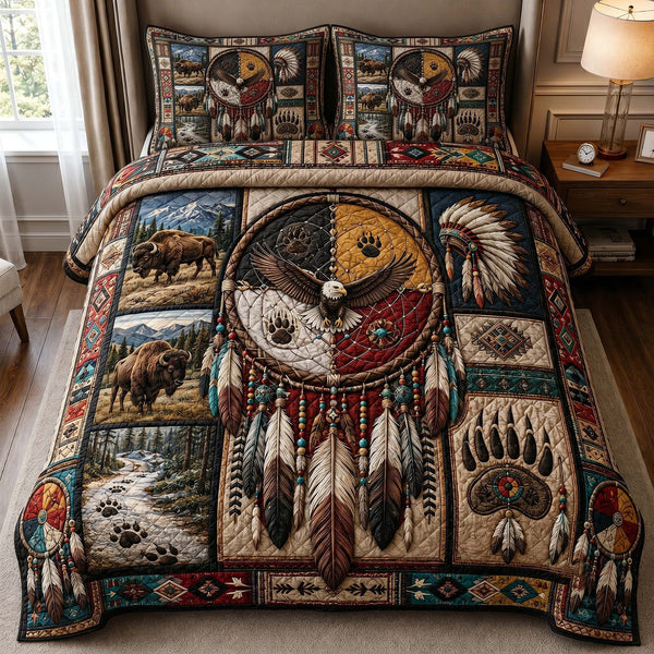 Ancestral Roots quilted 3-piece bedding set on a made bed with two matching pillow shams