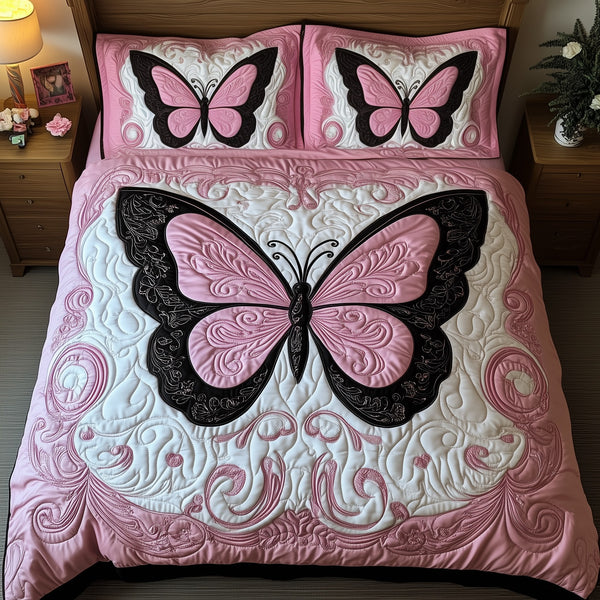 Butterfly Dreamscape quilted 3-piece bedding set on a made bed with two matching pillow shams