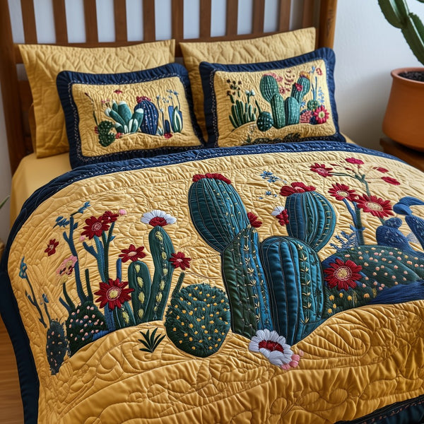 Cactus Haven quilted 3-piece bedding set on a made bed with two matching pillow shams