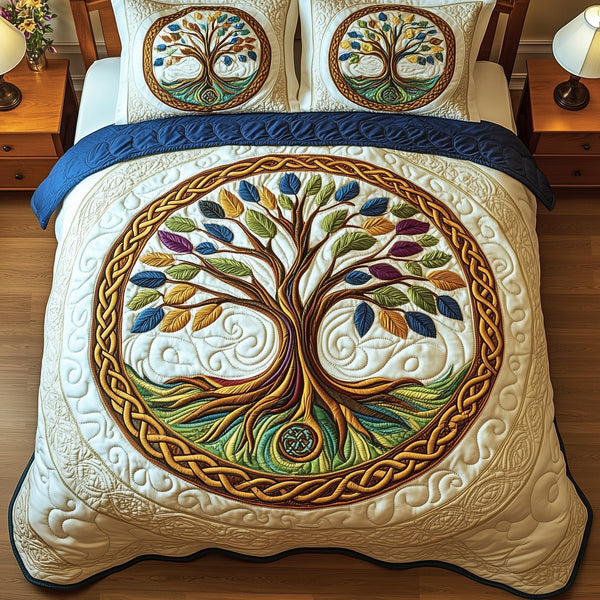 Celtic Heritage Tree quilted 3-piece bedding set on a made bed in a farmhouse bedroom